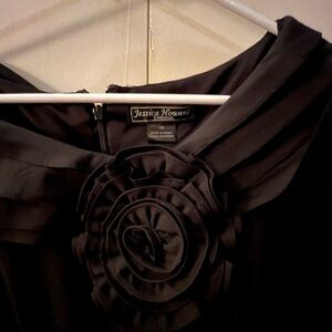 Beautiful black dress with a little puff in the slip liner